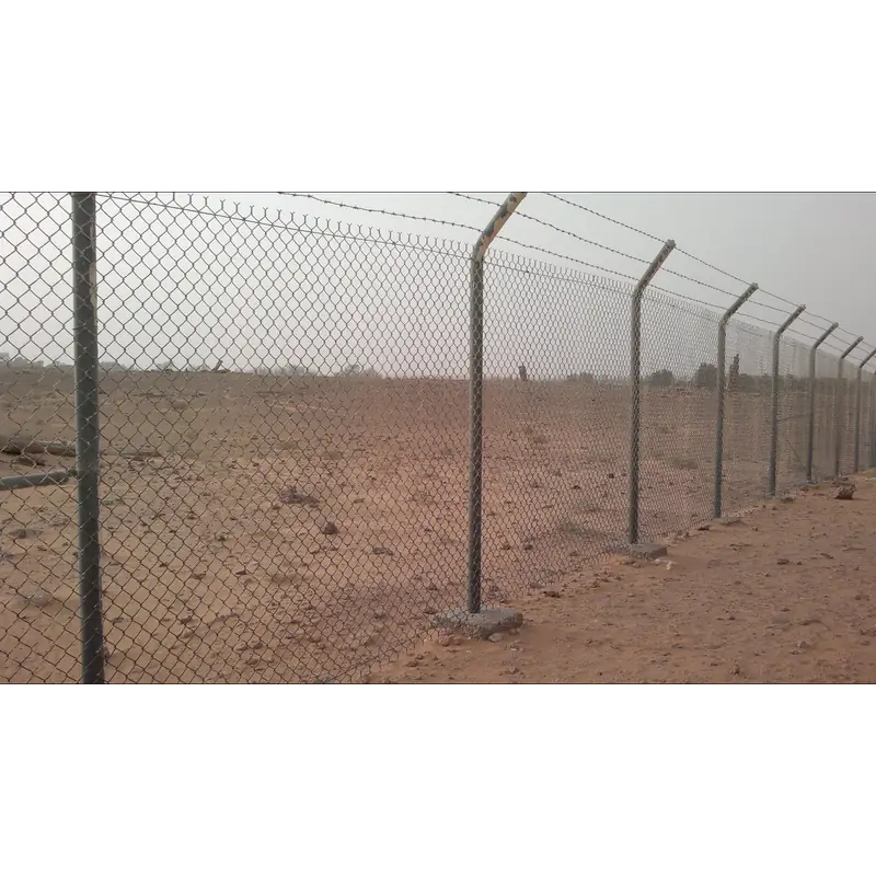 Ruins Near Dumah: it is common practice in Saudi Arabia to fence archaeological sites.